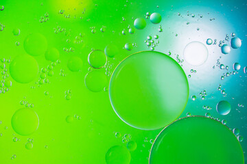 Colorful artistic image of oil drop on water for modern and creation design background.