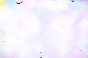 Colorful artistic image of oil drop on water for modern and creation design background.