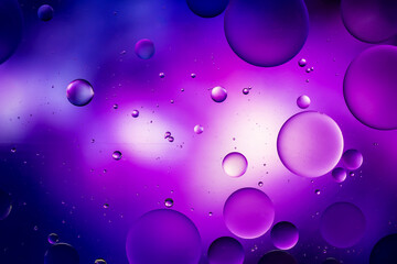 Colorful artistic image of oil drop on water for modern and creation design background.