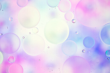 Colorful artistic image of oil drop on water for modern and creation design background.