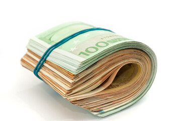 Euro banknotes in bundle isolated on white.Money connected by an elastic band. Much money.