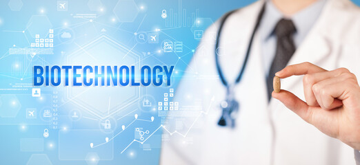 Doctor giving a pill with BIOTECHNOLOGY inscription, new technology solution concept