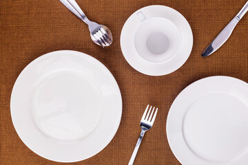 Empty white plate and kitchenware