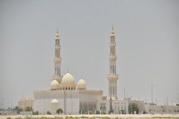 Fototapeta na wymiar Mosque in blue sky background.Abu Dhabi,UAE.02.06.2020.Editorial.