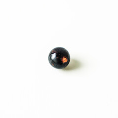fresh black currant on white background