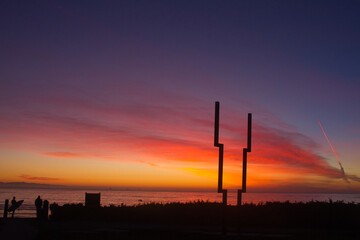 Missile launch at sunset from Vandenberg Air Force base in California