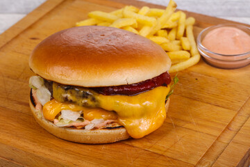 Burger with beef, cheese and iceberg salad