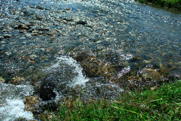 water flowing into the river