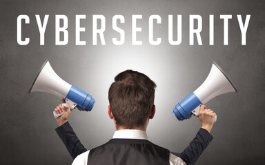 Rear view of a businessman with CYBERSECURITY inscription, cyber security concept