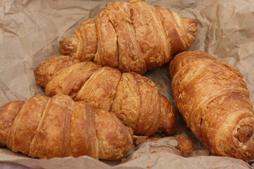 Delicious fresh croissants on a picnic macro