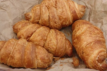 Delicious fresh croissants on a picnic macro