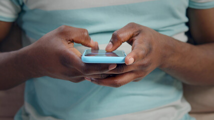 Businessman hand using mobile smart phone browsing social media app