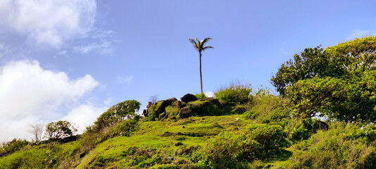 The beauty of sea, rocks and sky in the monsoon.