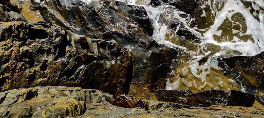 The beauty of sea, rocks and sky in the monsoon.