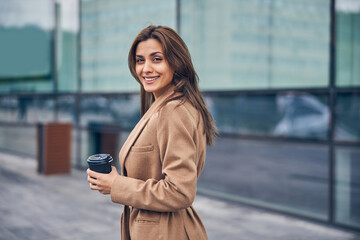Fototapeta premium Happy pretty lady looking at the camera