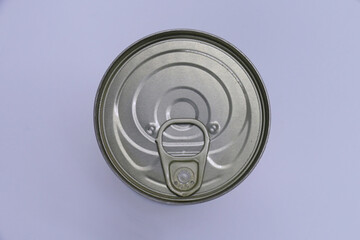Can of food viewed from above with gray background.