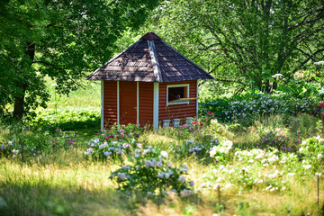 Fototapeta na wymiar Summer house in the garden