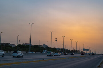 Highway traffic at sunset in eastern province of Saudi Arabia