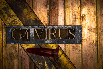 G4 Virus text formed with real authentic typeset letters on vintage textured silver grunge copper and gold background