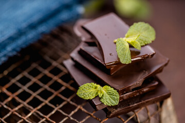 dark or milk chocolate bars with green mint leaf