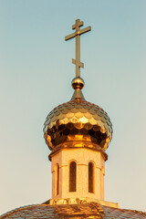 Golden dome with a cross of the Orthodox Cathedral