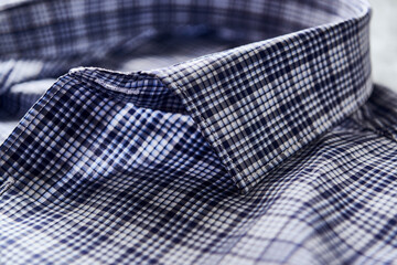 Close up of Men's checkered shirt.