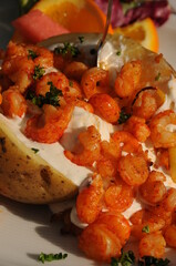 Big potato with fresh shrimps