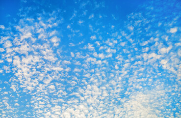 Fototapeta na wymiar Blue sky background with beautiful natural white clouds.
