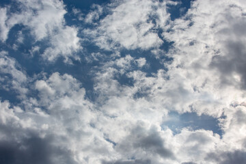 cumulus clouds on a blue sky