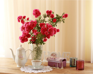 summer morning with the scent of roses and tea with milk