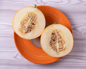 tasty delicious sweet fresh raw ripe orange melon in halves