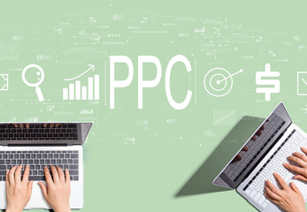 PPC - Pay per click concept with people working together with laptop computers