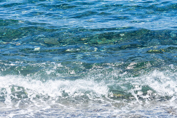 Fototapeta premium Colored and clean waves in a paradise beach