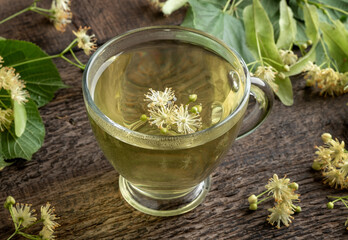 Linden flower tea in a transparent cup