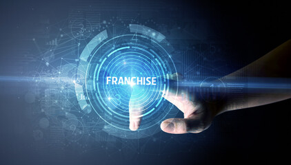 Hand touching FRANCHISE button, modern business technology concept