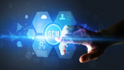 Hand touching SCM inscription, new technology concept