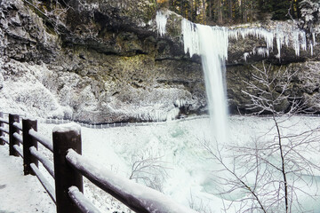 South Falls at Silver Falls State Park after a snow and ice storm - near Silverton, Oregon.  The...
