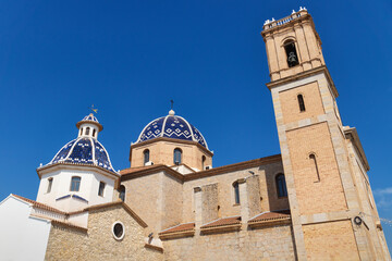 Fototapeta premium Our Lady of Solace Church with blue tiled domes and bell tower in Altea, Costa Blanca, Spain