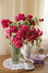summer morning with the scent of roses and tea with milk