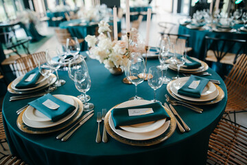 The Concept Of Wedding Decor. Gold and hunter green decor