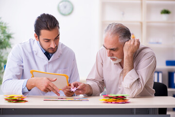 Doctor and patient suffering from Alzheimer disease