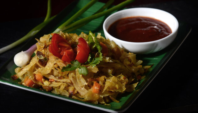 A spicy one-dish vegetarian dinner with curry flavors. Vegetable kottu roti is a traditional Sri Lankan street food.