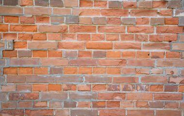 old brick wall, rough texture with, red, gray, brown bricks, bright background