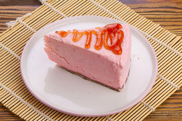 delicious cheesecake with strawberries on  plate