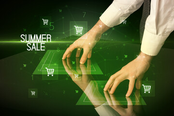 Online shopping with SUMMER SALE inscription concept, with shopping cart icons
