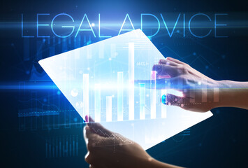 Hand holding futuristic tablet with LEGAL ADVICE inscription above, modern business concept