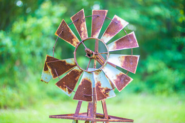 Rusted broken old metal windmill