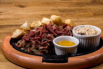 dried beef  with cassava, traditional brazilian food