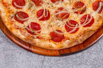 pepperoni pizza on gray background