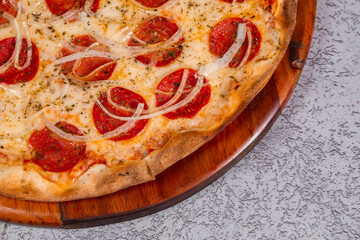 pepperoni pizza on gray background